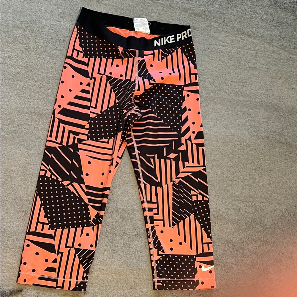 Nike Women’s' Coral and Black Geometric Capri Leggings